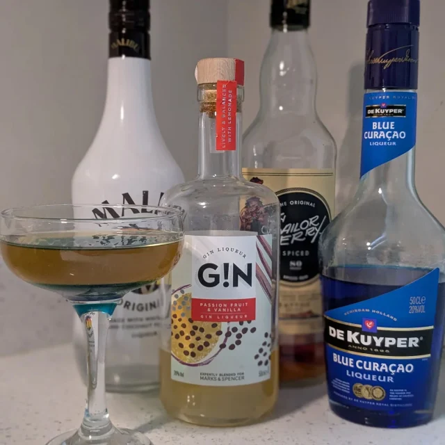 AI 2024 NYE Cocktails 

Cocktails created by ChatGPT from ingredients in my drinks cabinet 🫠 

Number 3: **Tropical Sunset**

 - **Ingredients**: Spiced Rum, Malibu, Passion Fruit and Vanilla Gin, Blue Curacao

 - **Instructions**:
 1. In a shaker, combine 1 oz Spiced Rum, 1 oz Malibu, and 1 oz Passion Fruit and Vanilla Gin.
 2. Shake with ice and strain into a glass filled with ice.
 3. Slowly add 1/2 oz Blue Curacao, letting it settle at the bottom for a layered effect.
 4. Garnish with a pineapple slice or maraschino cherry.

#newyearseve2024
#newyearsevecocktails