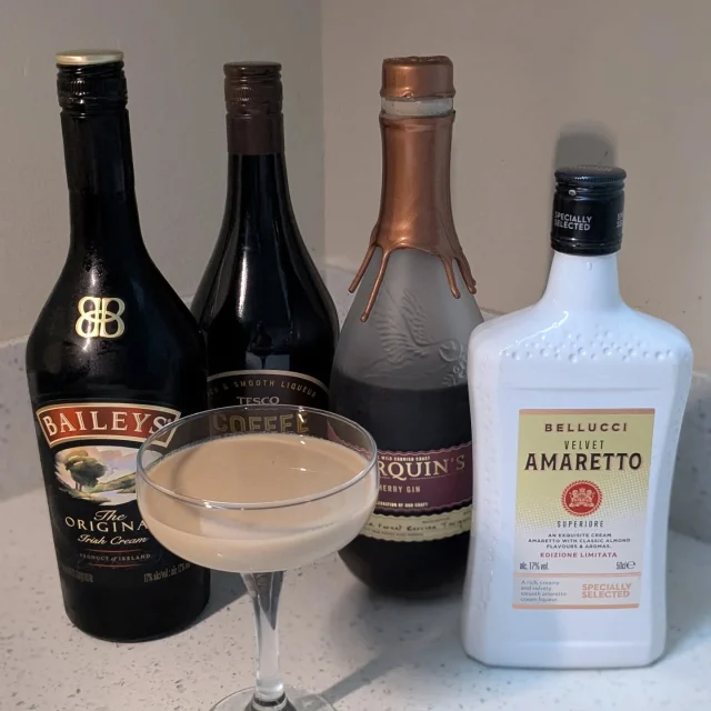 AI 2024 NYE Cocktails 

Cocktails created by ChatGPT from ingredients in my drinks cabinet 🫠 

Number 2: **Creamy Cherry Delight**

 - **Ingredients**: Black Cherry Gin, Baileys, Velvet Amaretto, Coffee Liqueur

 - **Instructions**:
 1. In a shaker, combine 1 oz Black Cherry Gin, 1 oz Baileys, 1/2 oz Velvet Amaretto, and 1/2 oz Coffee Liqueur.
 2. Shake with ice and strain into a chilled coupe or martini glass.
 3. Garnish with a few chocolate-covered cherries or cocoa powder.